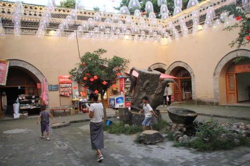  陕州地坑院夏与火燃爆陕州夜经济